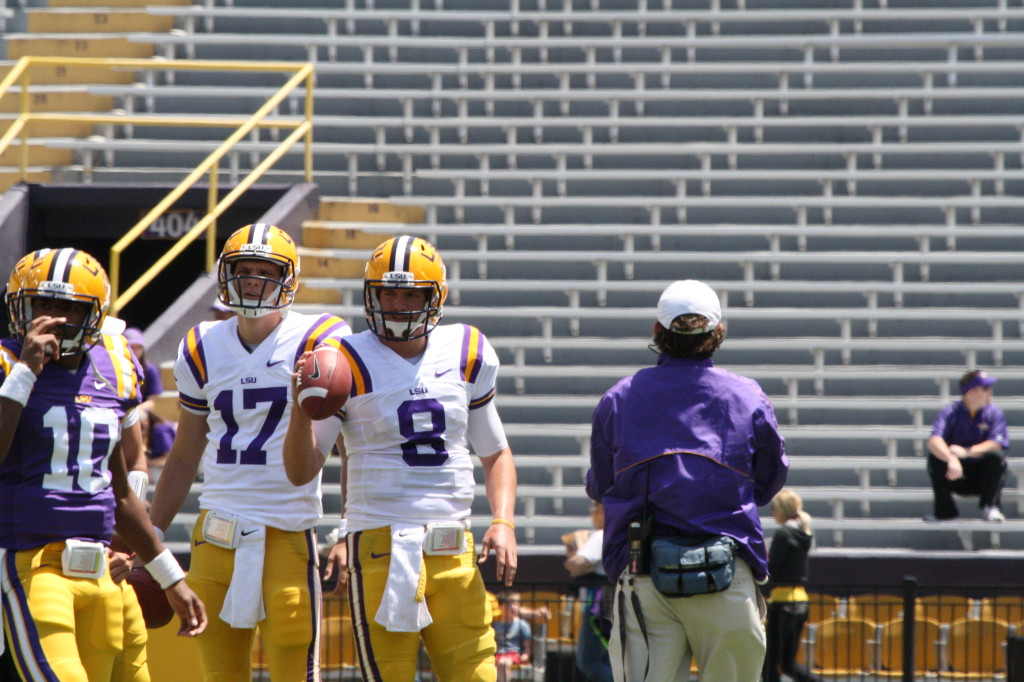 Mettenberger and Rivers warming up before the spring game.