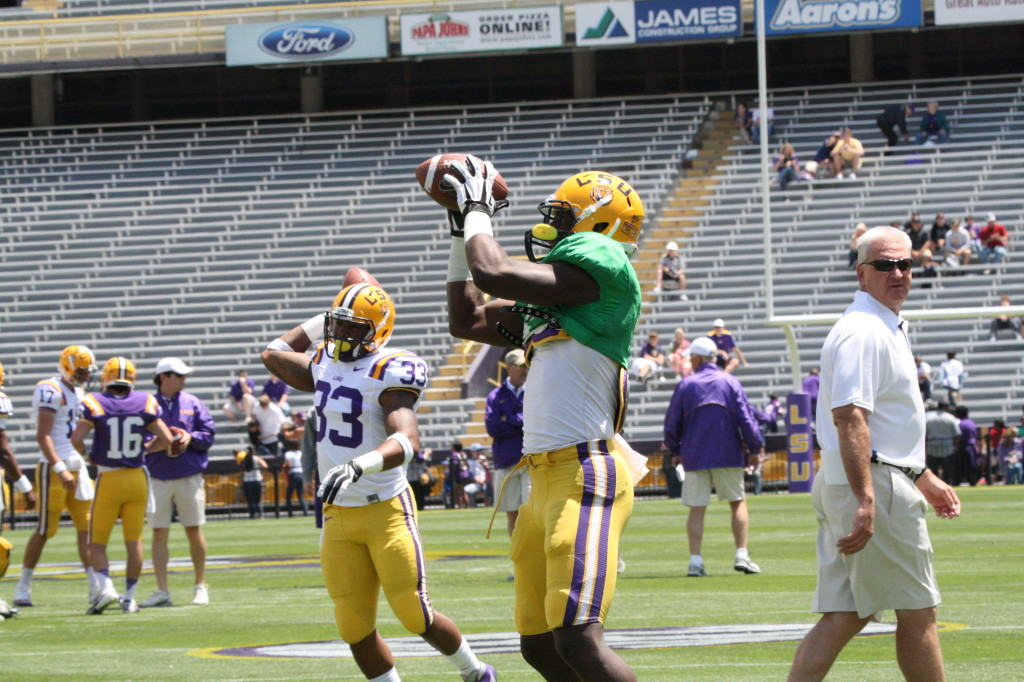 Alfred Blue and Jeremy Hill warming up for the spring game.
