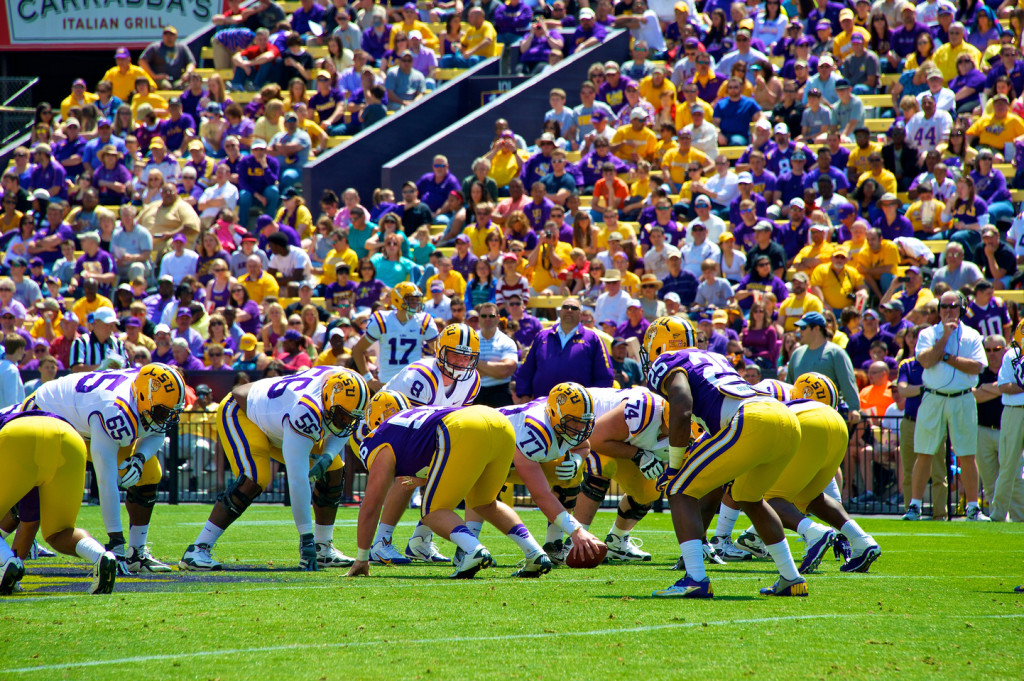 Rivers looks over the field.