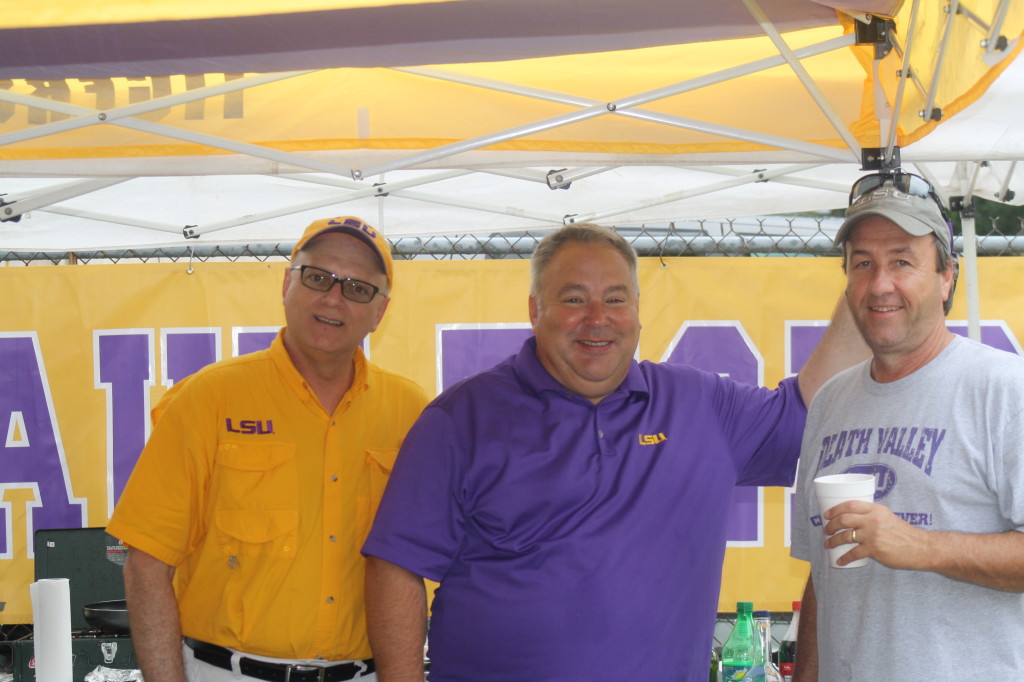 Co-worker Mr. Todd and friends cooking up some good food, tailgating at it's best.