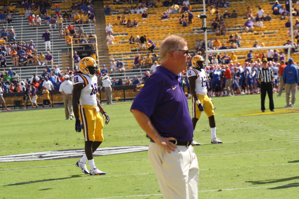 Cam Cameron on the field walking around before game time.