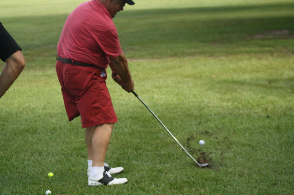 Billy digs one out of the grass...