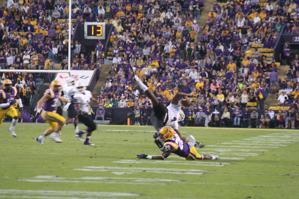 no.28 Jalen Mills takes a Furman player.