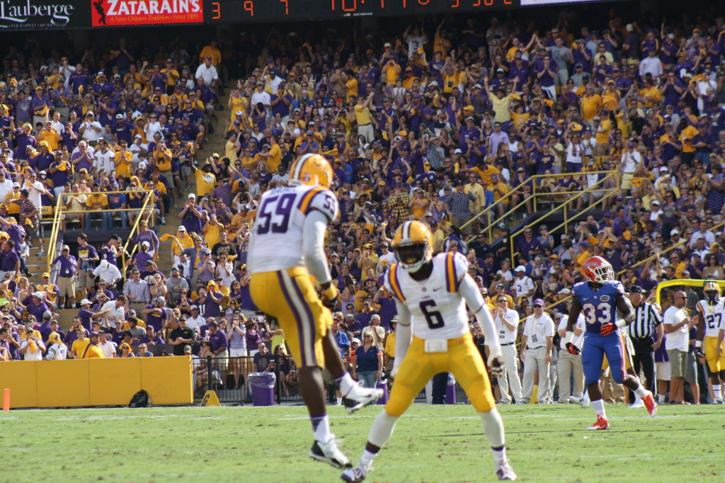 no.6 Loston and Rasco celebrating after a sacked on QB Murphy.