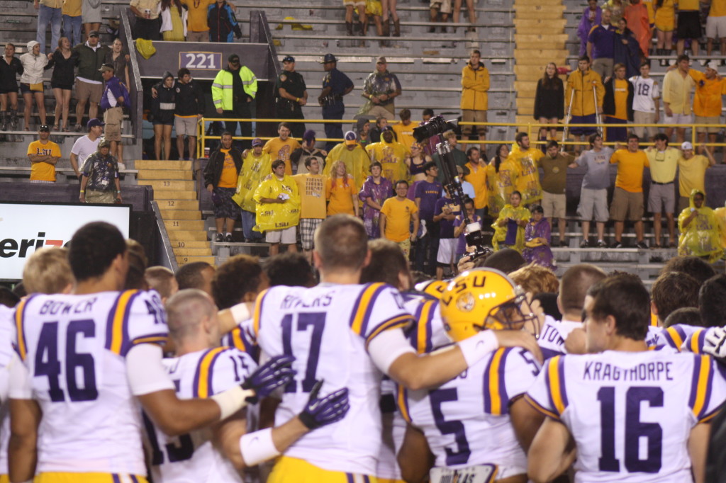 LSU players are singing with the student section.