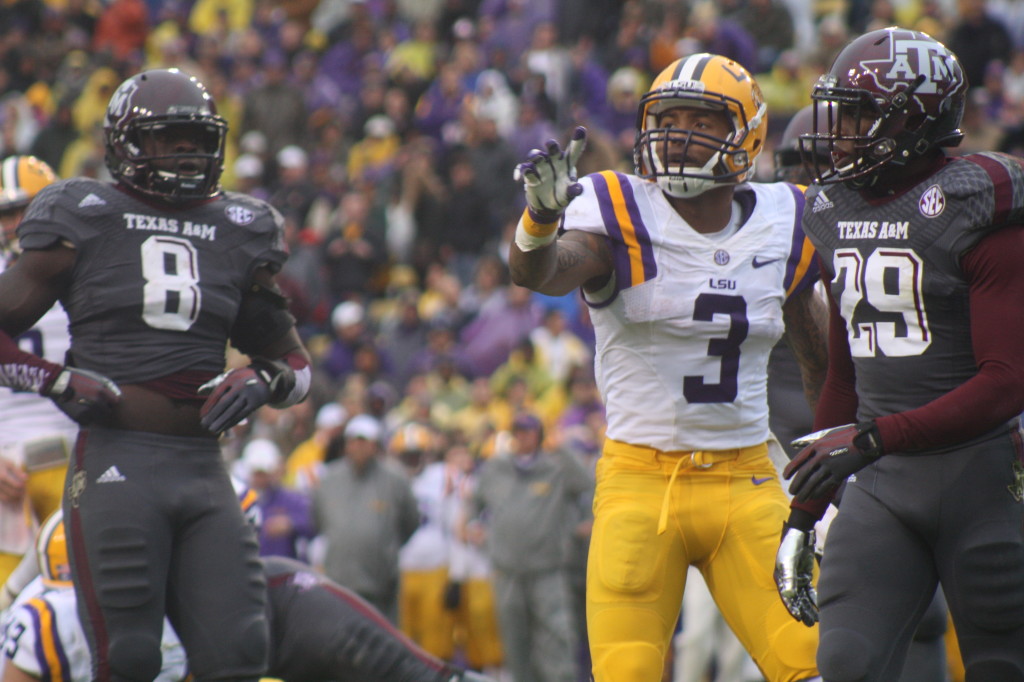 Becham,Jr flips the ball to the ref after a big catch.