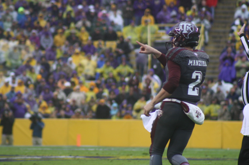 QB Manziel pointing down the field. Manziel didnt have his A game on saturday, but I am sure the LSU Crowd and defense were okay with that.