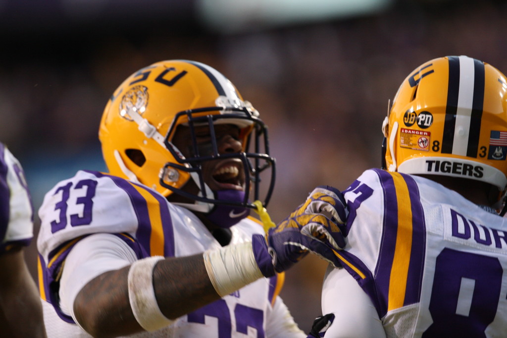 RB Jeremy Hill celebrates with Travis Dural after he made the winning catch for a 49 yard TD.