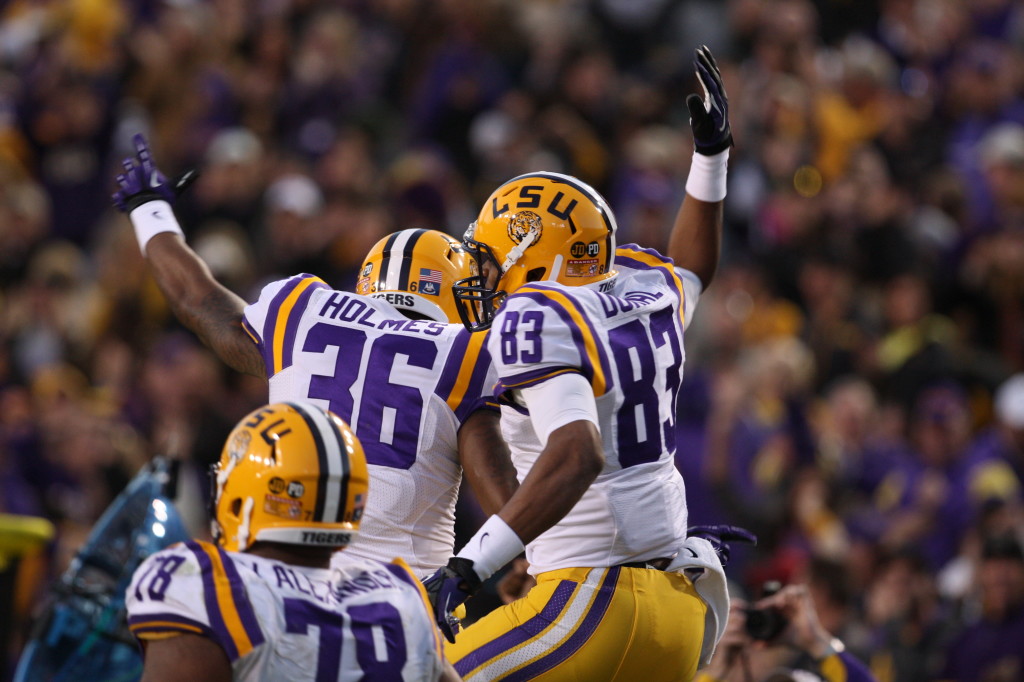 Travis Dural celebrates after his winning catch, a play the Jarvis Landry called for the winning score. The play was called Tsunami.