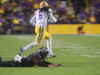 LSU Lofton intercepts the ball as Maziel misses the tackle.