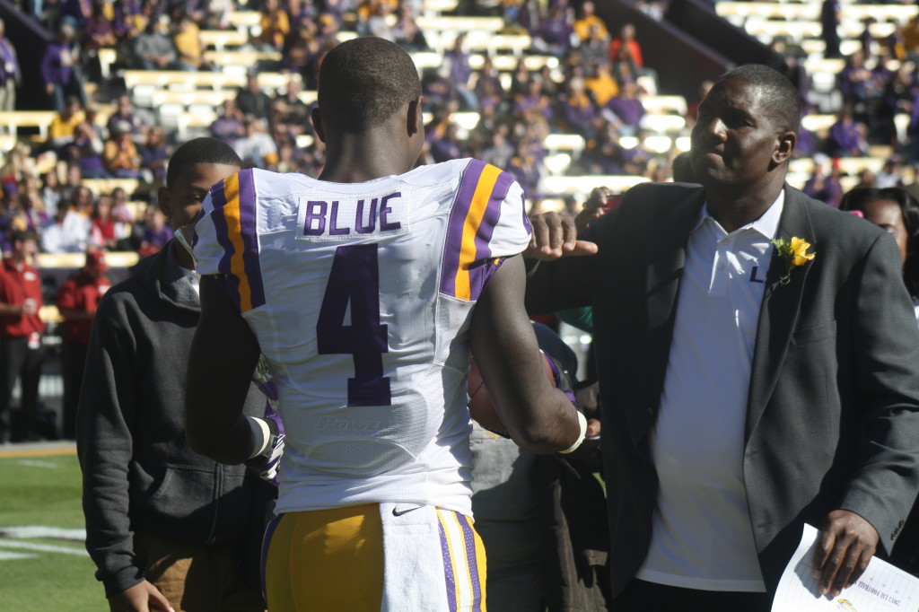 LSU RB Alfred Blue gets a welcome from his dad.