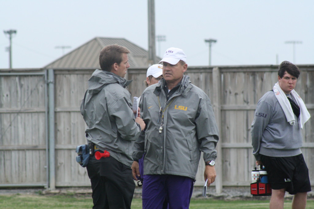 Coach Miles having a chat.