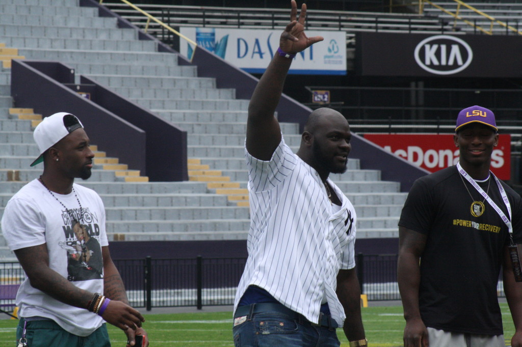 Anthony Johnson waves at the LSU crowd