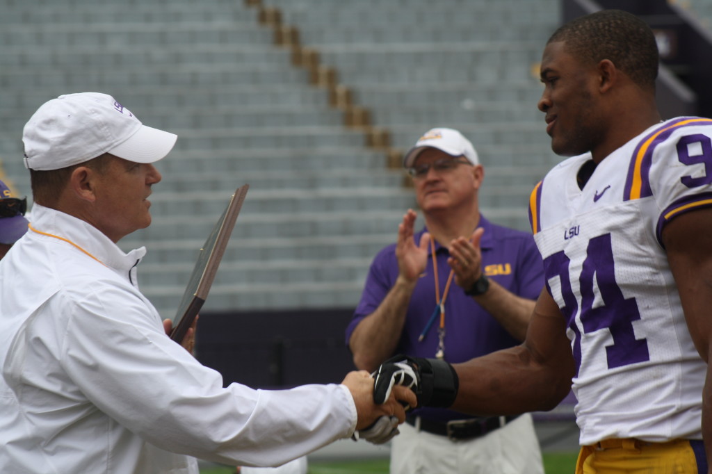 Coach Miles presented a award to 94 Darnielle Hunter