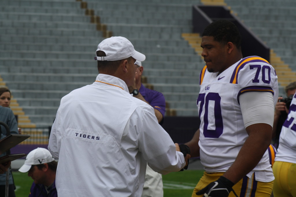 Coach Miles gives a award to La EL Collins