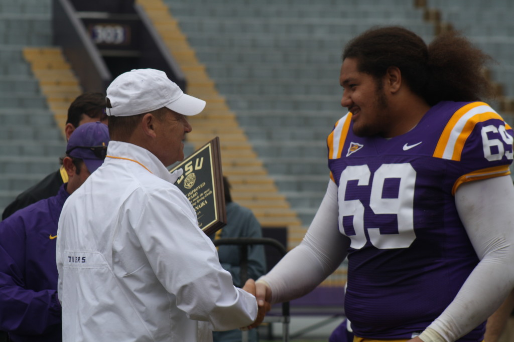 Cocoa Fanaika receives a award from Coach Miles