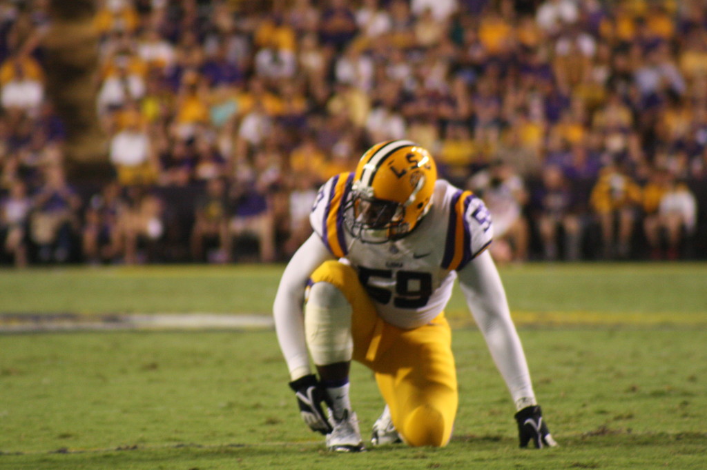 LSU Rasco taking one knee