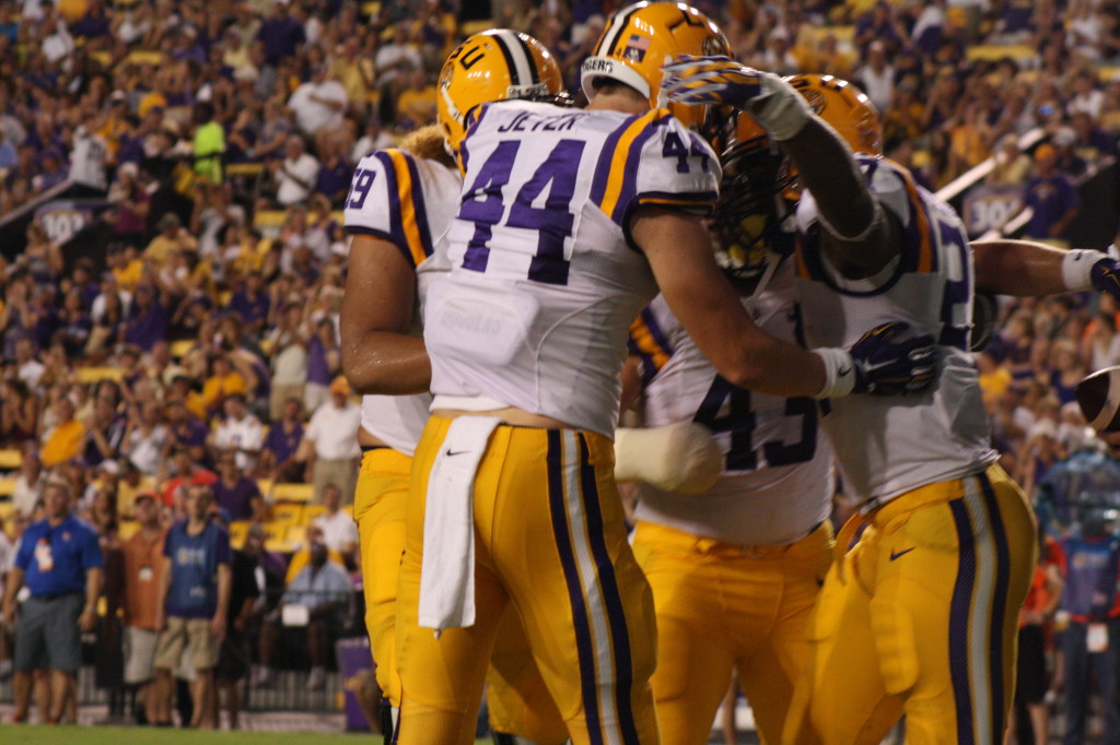 The team congrats Hillard for scoring a 2 pt conversion