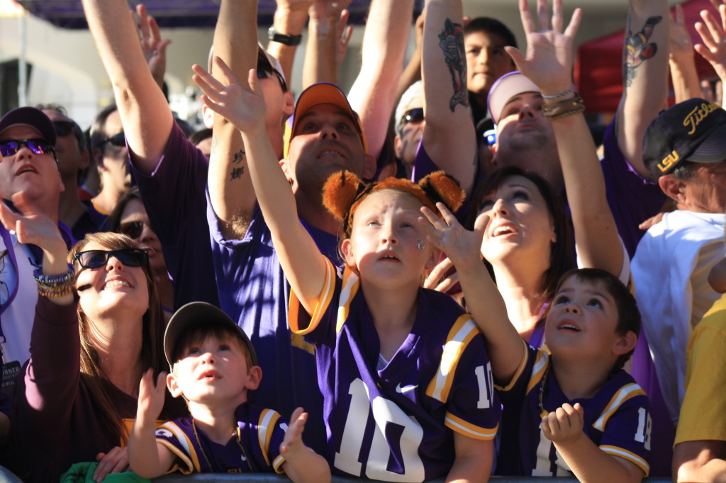 LSU Fans trying to catch some t shirts. 