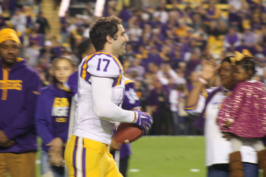 LSU Myles O'Brien  running out to greet his family for Senior Day.