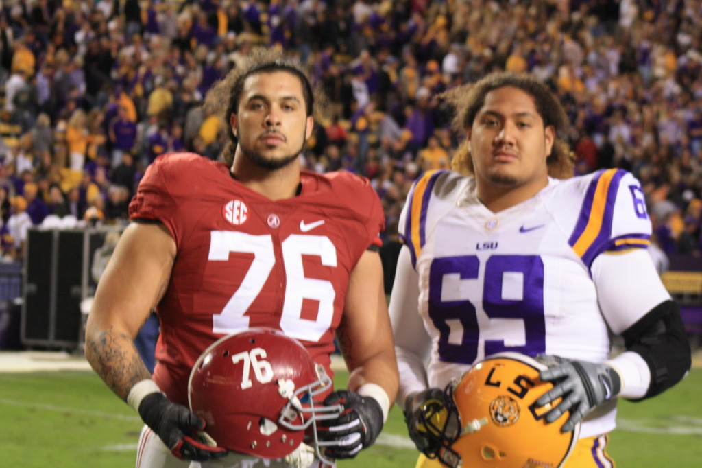   Alabama DL Dominick Jackson and LSU G Hoko Fanaika hanging out after the LSU vs Alabama Game.