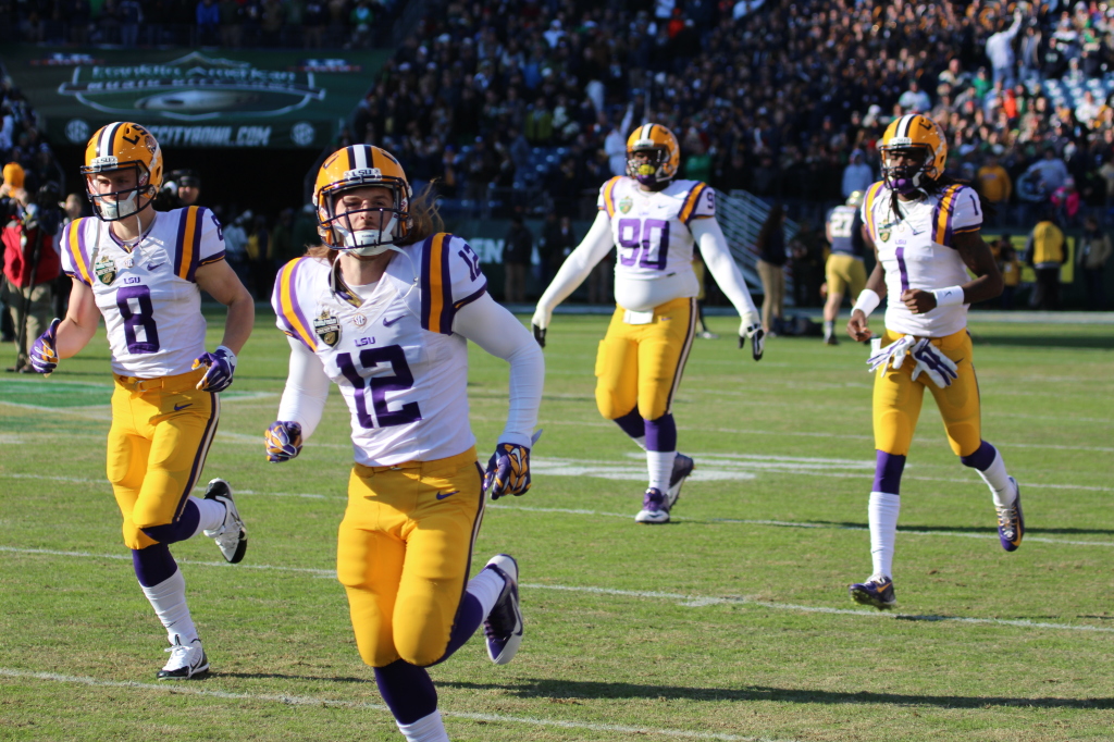 LSU Players running out on to the field.