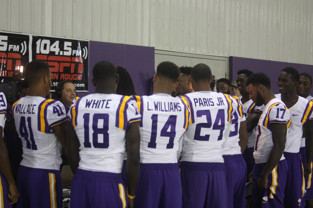 LSU DBU's gather around the 104.5 fm table.