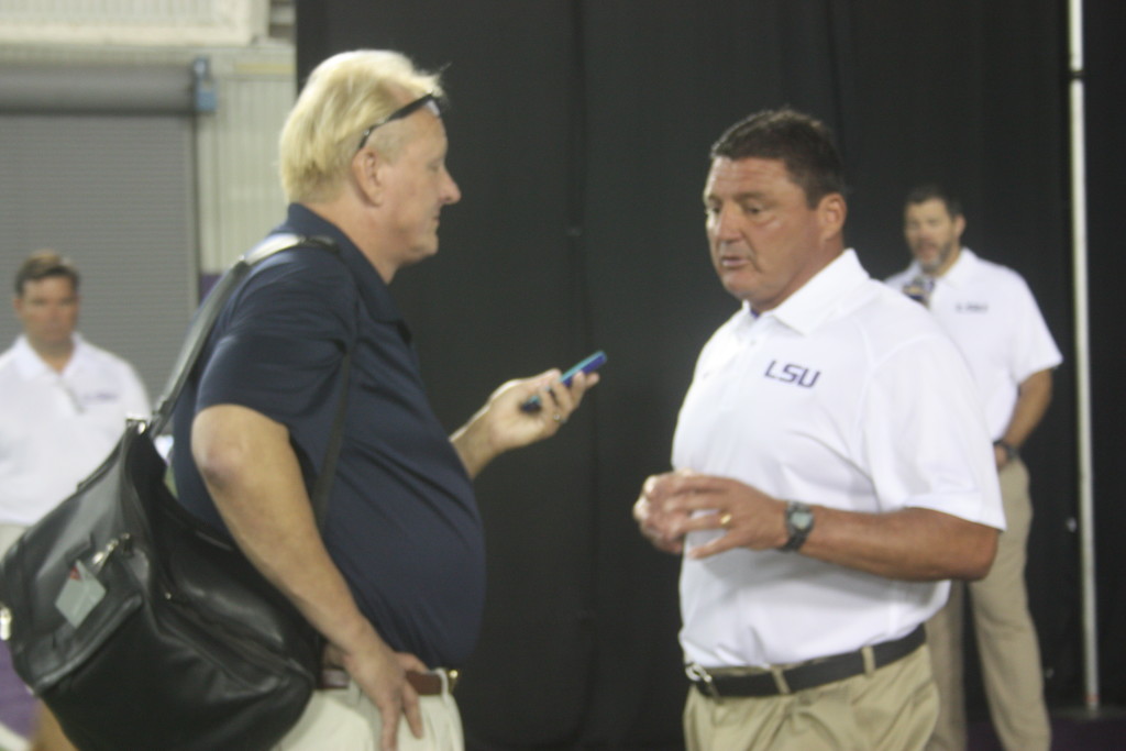LSU D Line COach Ed Orgeron talking during media day.