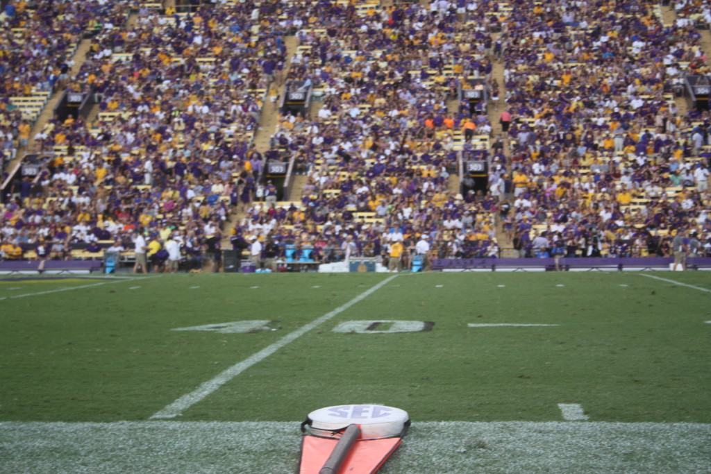 DCF sitting on the LSU Bench during the weather delay.