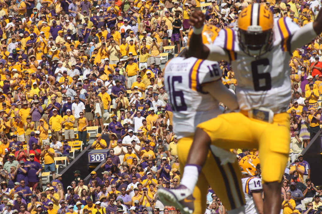 LSU qb Harris celebrates a td with holder Krag thorpe. 