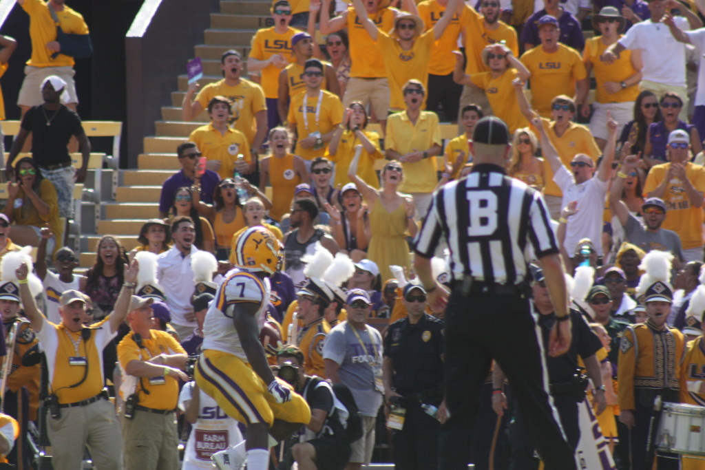 Founette begins his celebration, and the fans are going crazy.