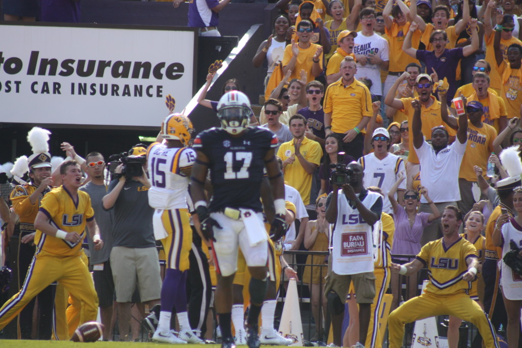 The fans celebrating with Fournette, look at the LSU Cheerleader, great excitement. Auburn Kris Frost arrived late for the celebration.