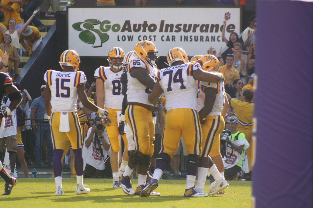 The LSU Line celebrates with Leonard Fournette after his 2nd td of the day.