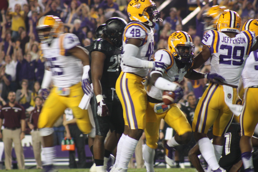 DB Donte Jackson jumps around after recovering the fumble.