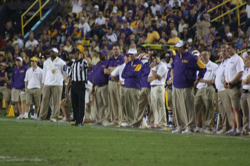 LSU Coach Miles calling the plays.