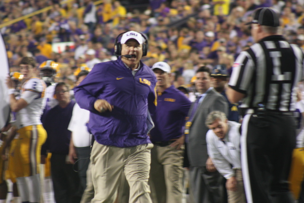 There goes Coach Miles to talk to the refs.