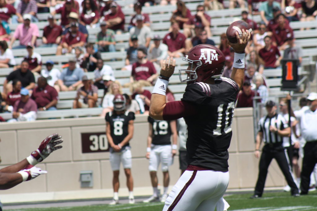 Jake Hubenak rares back to throw a pass.