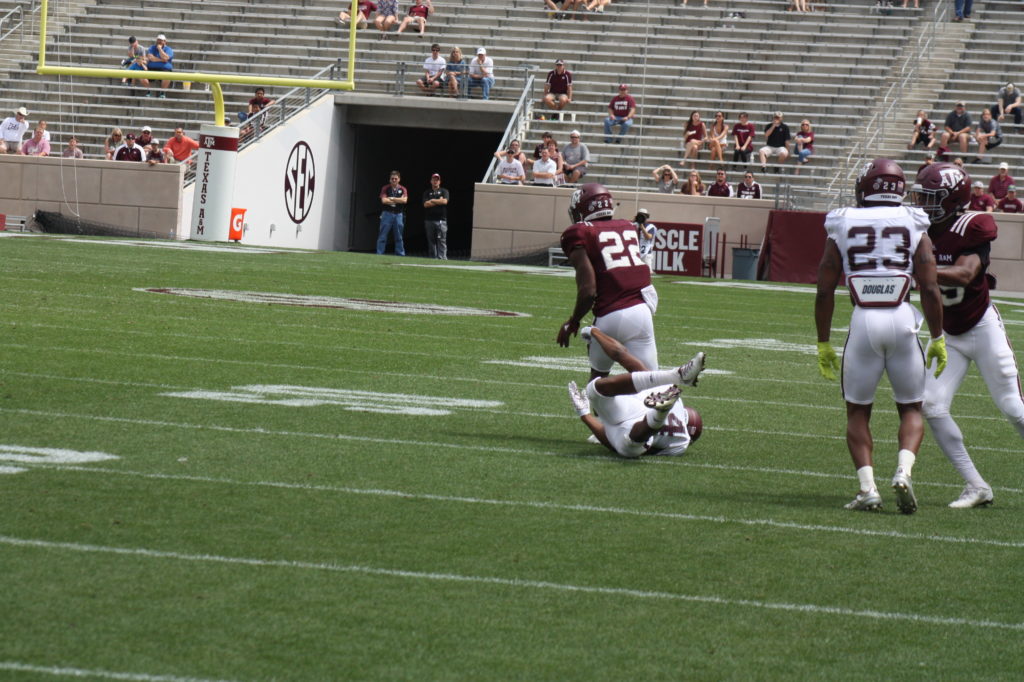 no.22 Kwame gets away from the tackle.