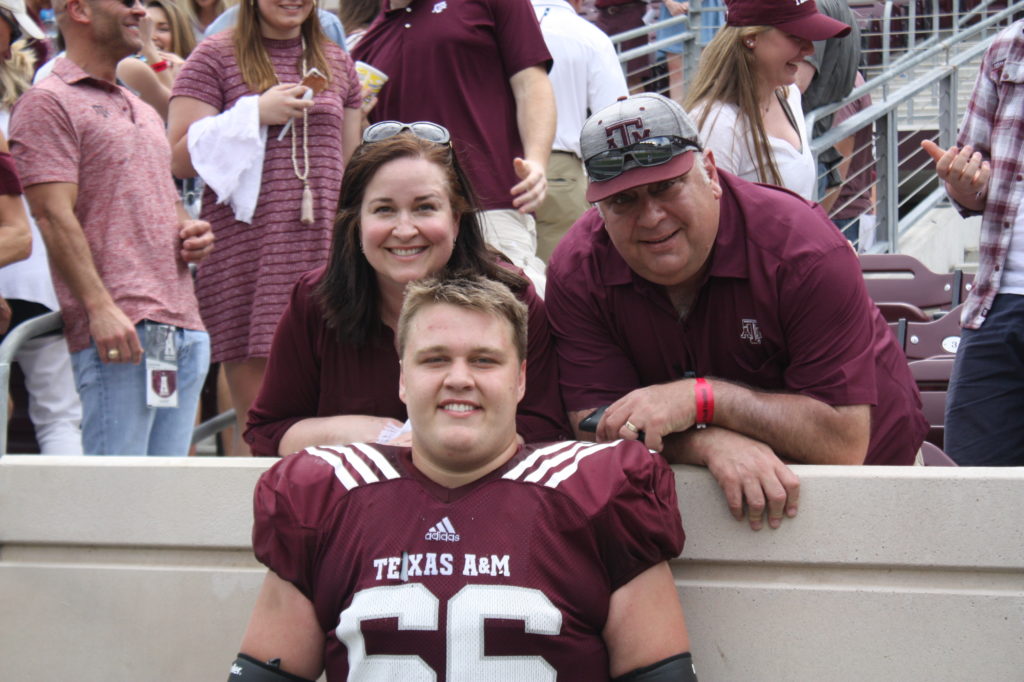 Texas A&M guard Robert Congel at the A&M Spring Game with his mom and dad