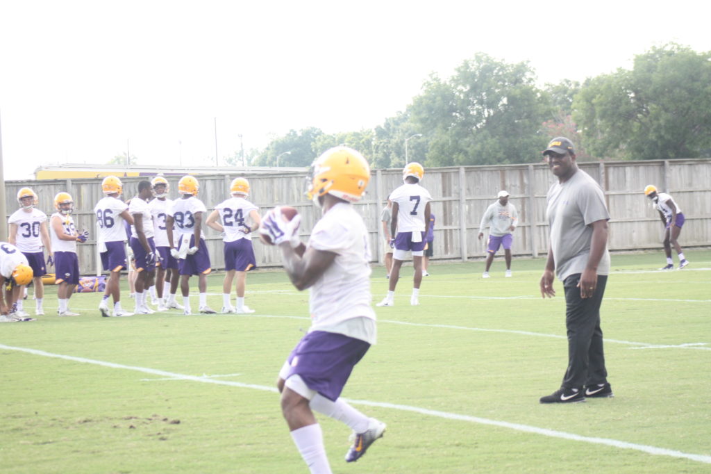 LSU backup RB Nick Brossette catches a pass and turns up field.