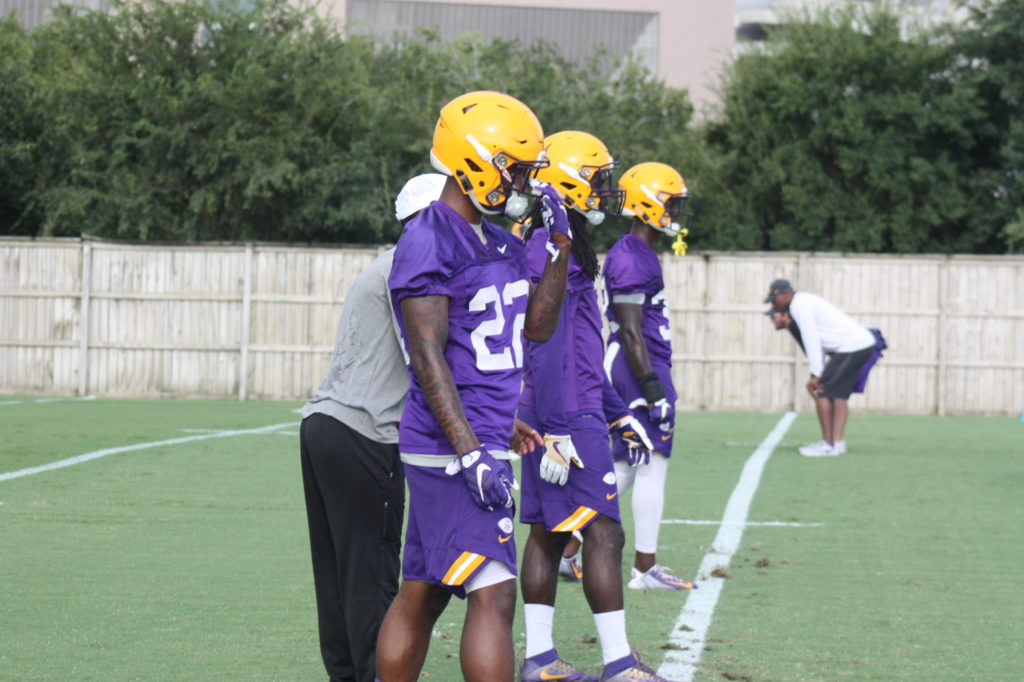 The LSU Db's waiting for some drills.